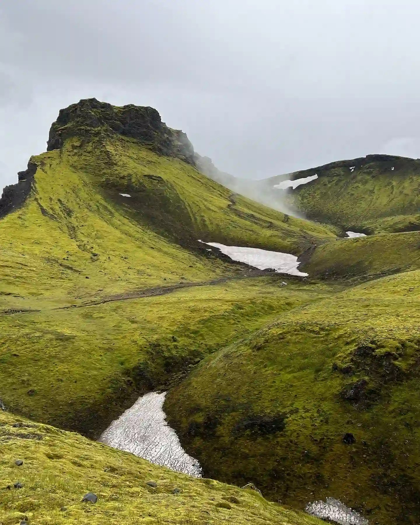 Green moss hills on the Fimmvörðuháls trail near Porsmork, Iceland