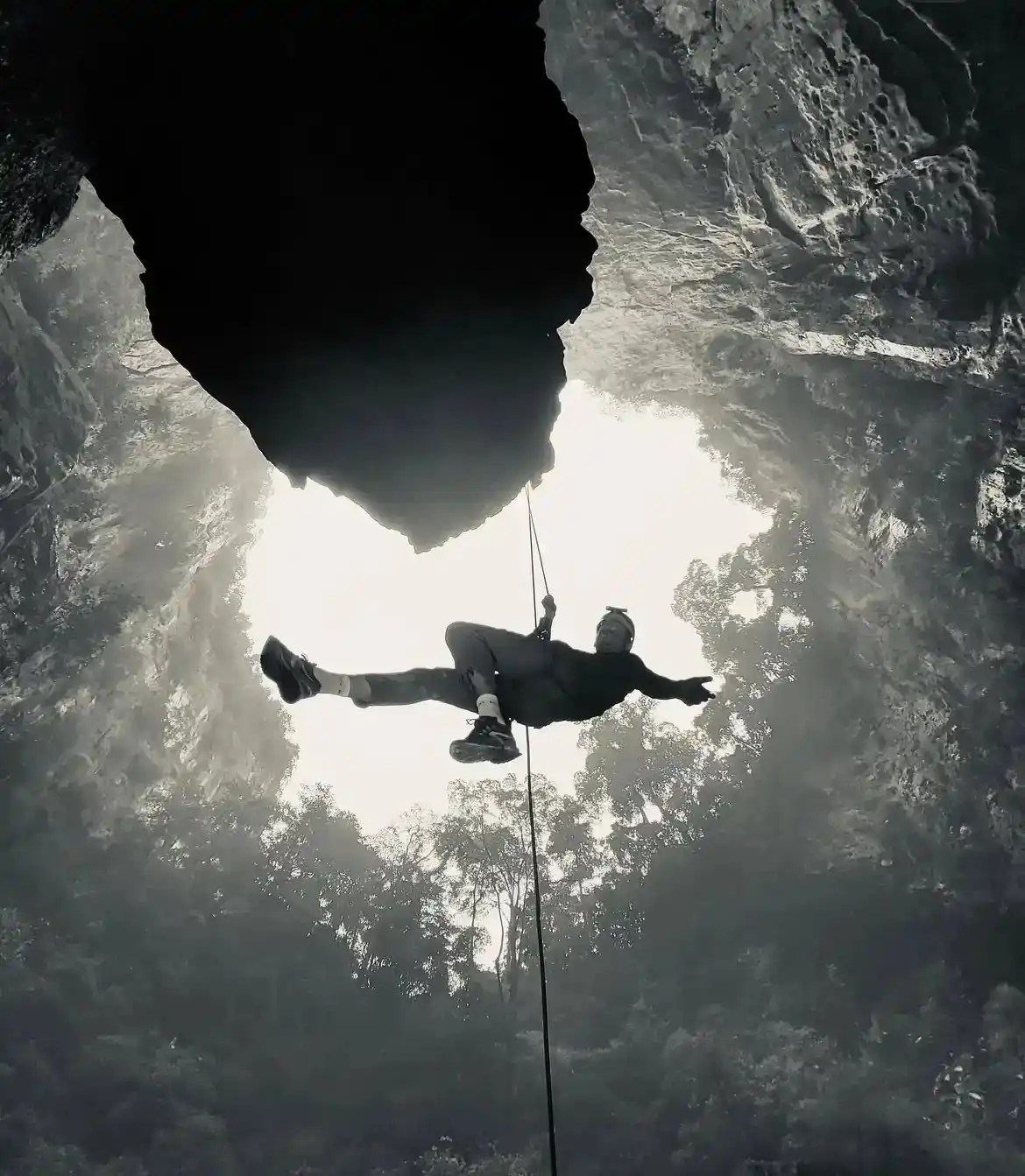 Me repelling in the Kong Collapse, Phong Nha, Vietnam