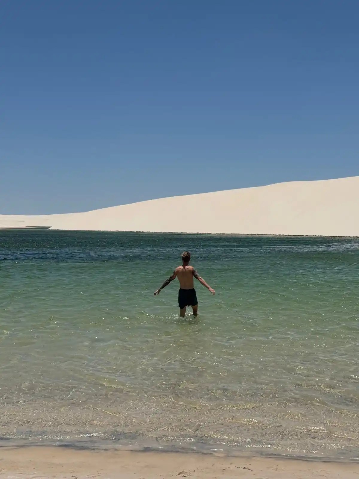 Me enjoying the water of a lagoon at Lencois Maranheses, Brasil